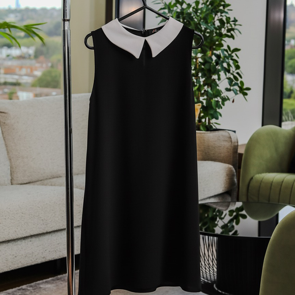 black and white peter pan collar dress Black Sleeveless Top with White Contrast Collar – Peter Pan Style – ThreadChain