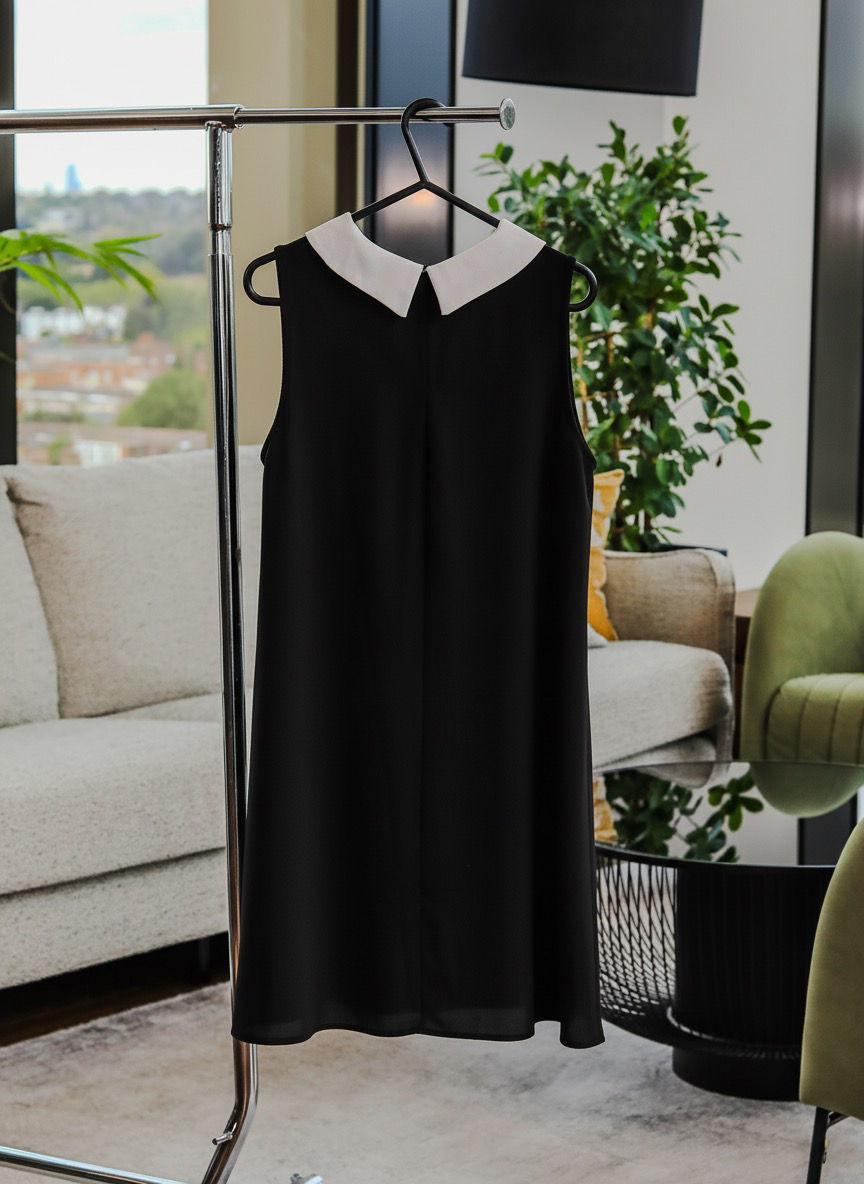 Black Sleeveless Top with White Contrast Collar – Peter Pan Style